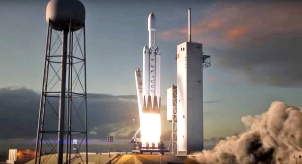 SpaceX lansează cea mai puternică rachetă din lume! Elon Musk îşi trimite autoturismul Tesla în spaţiu!