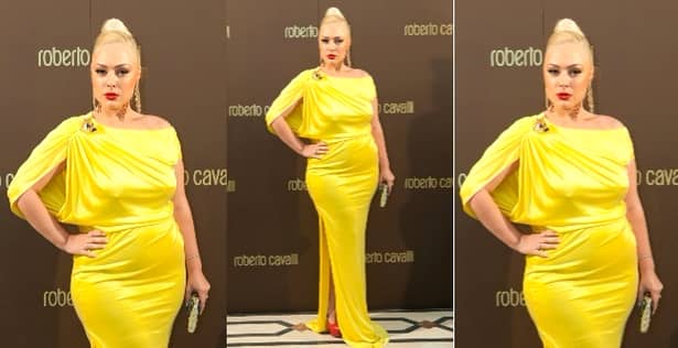 Giulia Nahmani grasa. Nahmany in cadrul unui eveniment îmbrăcată într-o rochie lungă galbenă