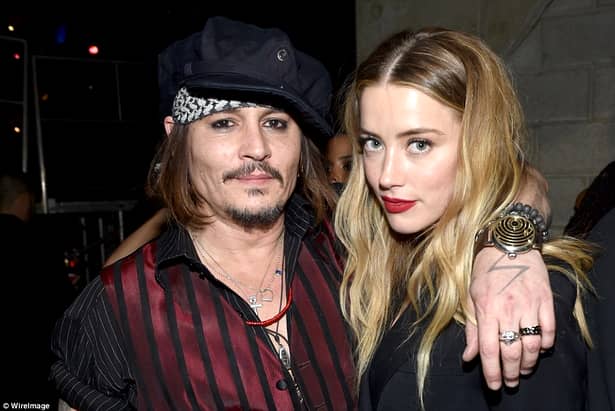 IMAGINI INCREDIBILE. Divorţul dintre Johnny Depp şi Amber Heard s-a lăsat cu BĂTAIE!