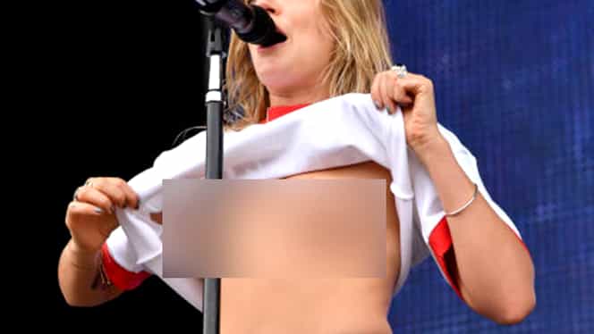 Imagini incendiare în timpul unui concert din provincie! Cântăreaţa şi-a ridicat bluziţa şi şi-a arătat sânii