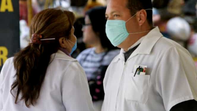 Măsuri împotriva gripei. E bine sau nu să folosim masca pe stradă?
